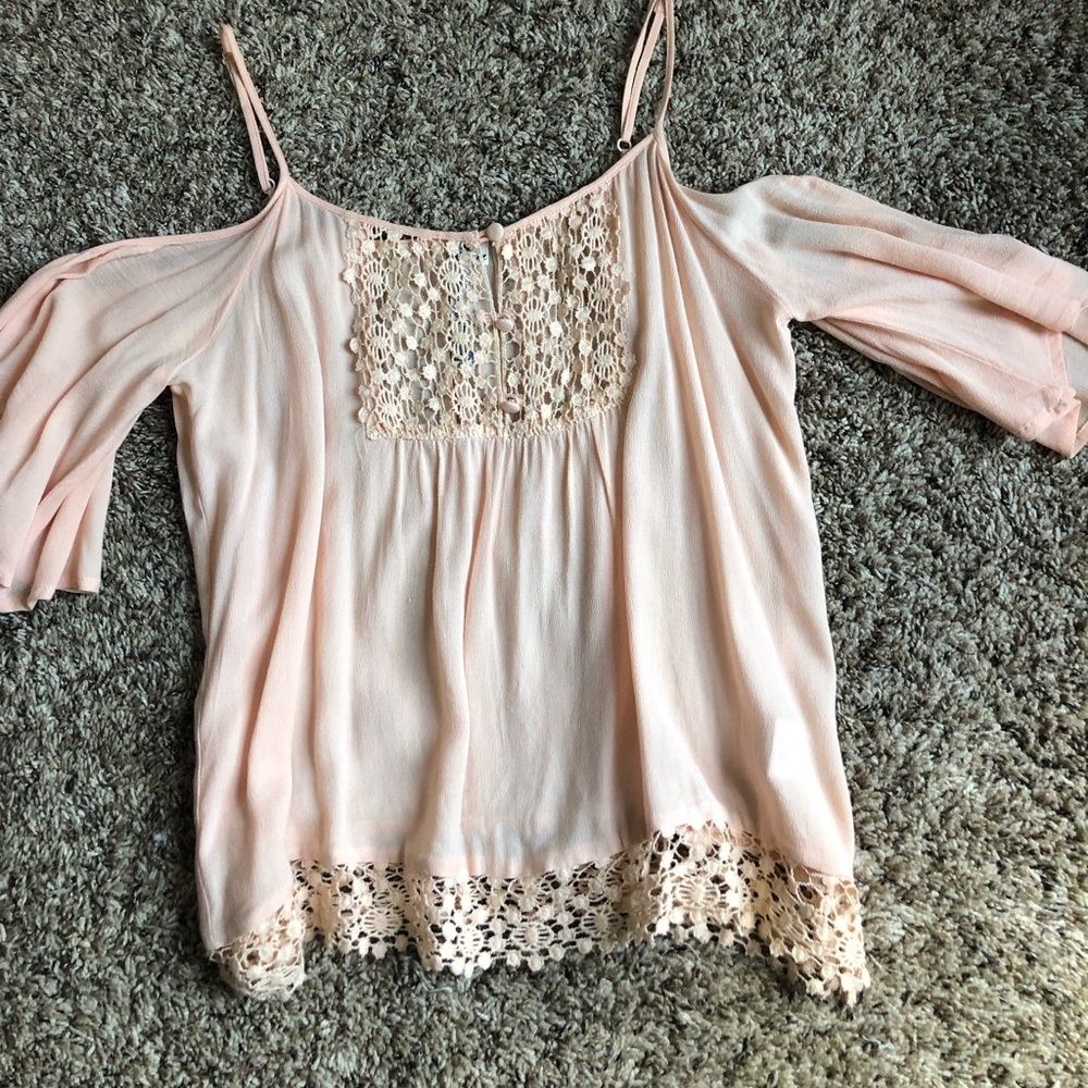 Over the shoulder pink tank